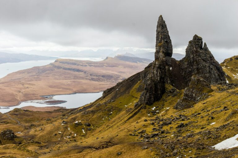 The rock pinnacles of the Old Man of Storr in golden light on the Isle of Skye