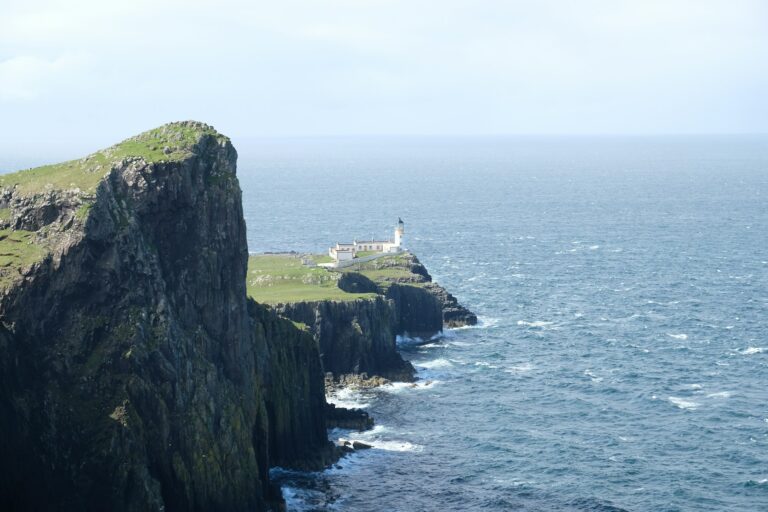 Neist Point lighthouse on the sea cliffs at the western tip of the Isle of Skye