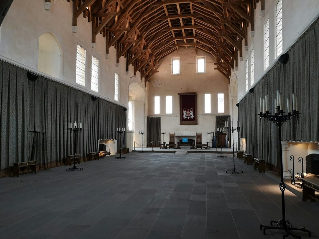 Inside the Great Hall at Stirling Castle, with its oak hammerbeam roof and the royal thrones at the far end